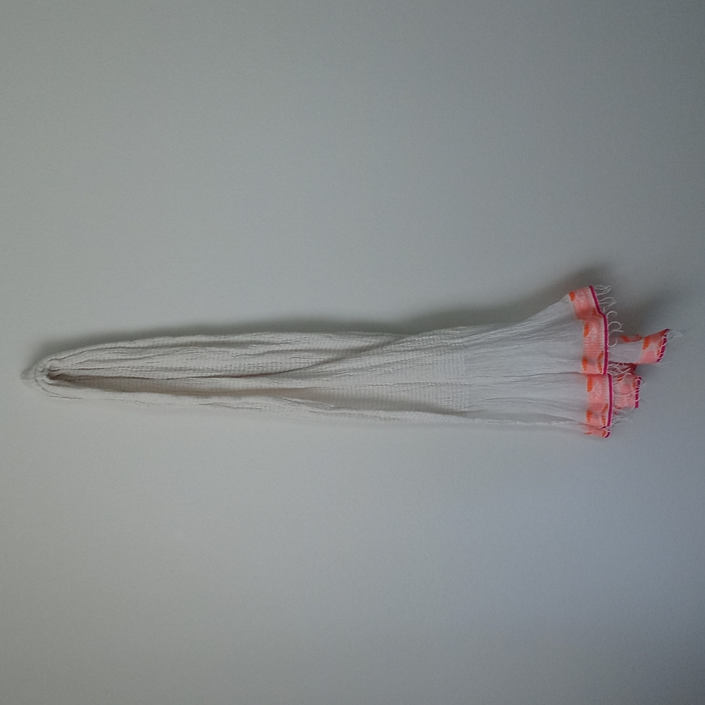 Woman's lemlem scarf made in Indonesia cream orange and fushia
